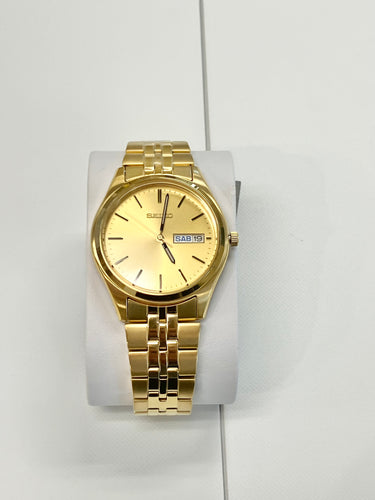 Seiko Stainless Steel Gold Toned Watch With Day And Date Calendar