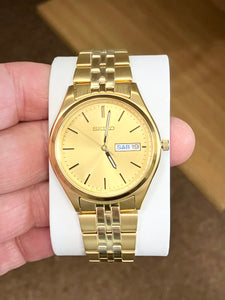 Seiko Stainless Steel Gold Toned Watch With Day And Date Calendar